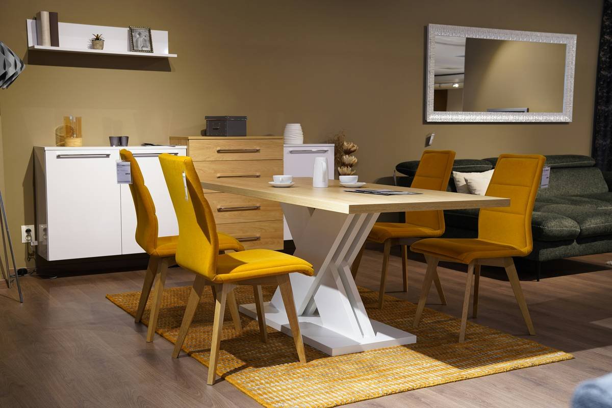 Infographic comparing solid wood vs. engineered wood chair frames, upholstery durability ratings, and ergonomic seat depth guidelines