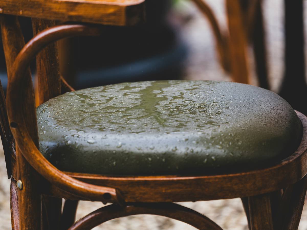 Side-by-side comparison of worn upholstery vs protected chair with furniture chair protectors