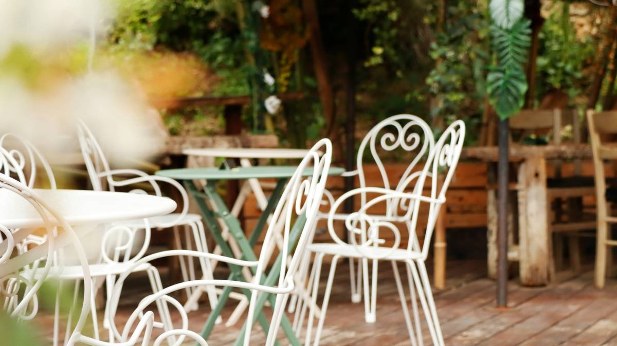 Durable outdoor furniture chairs made of marine-grade polymer on a sunlit patio